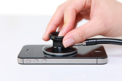 doctor examines a smart phone