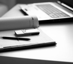 Tools businessman: a laptop, diaries, phone