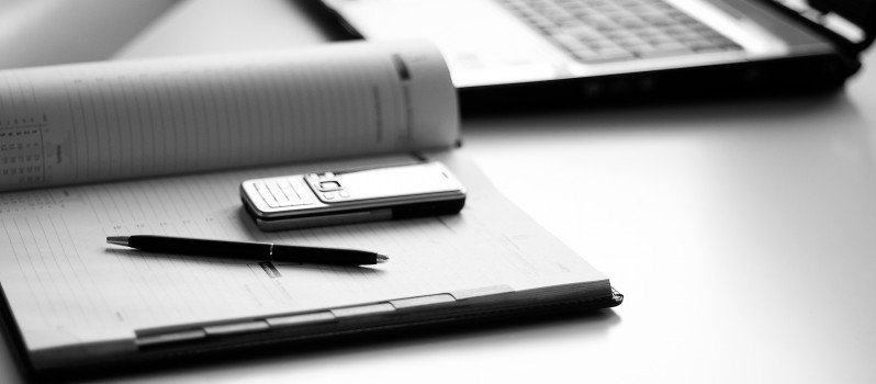 Tools businessman: a laptop, diaries, phone
